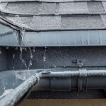 Rain running of a roof in Barrie