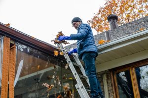 Roofing company installs new shingles