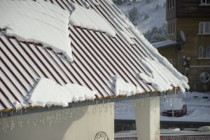 Roofing company installs new shingles